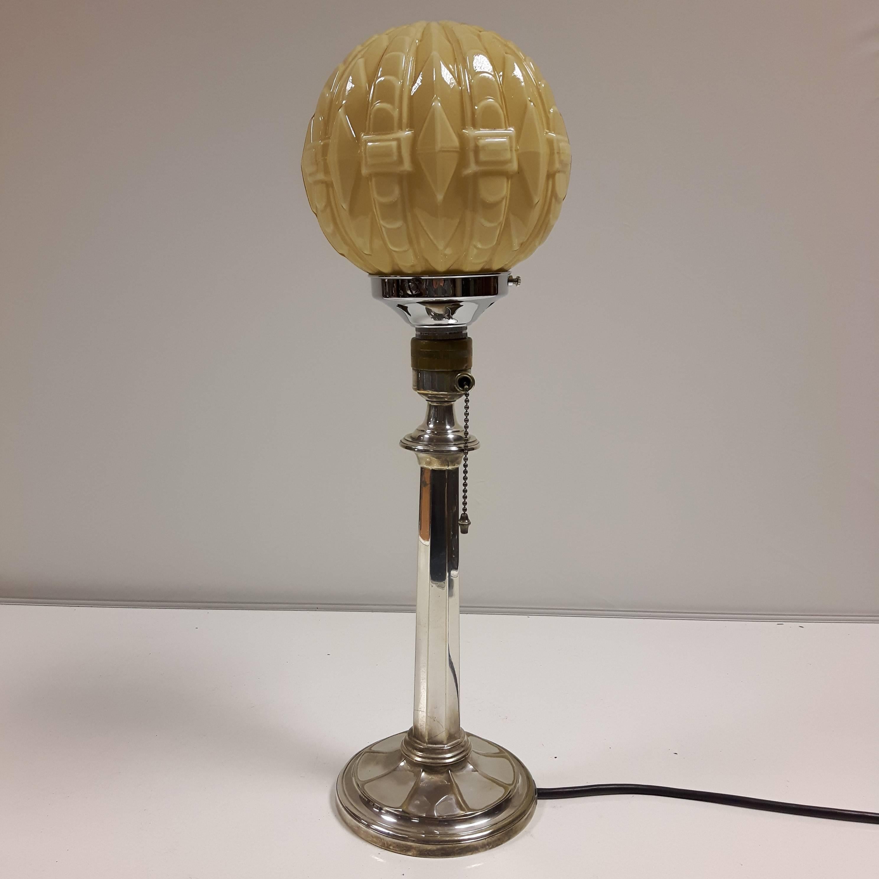 Rare, early 20th century silver plated table lamp produced by the famous jeweller, Mappin and Webb for the US market (still has the original pull chain), but rewired with a UK domestic plug. Stamped on the base with 'Mappin and Webb - Prince's