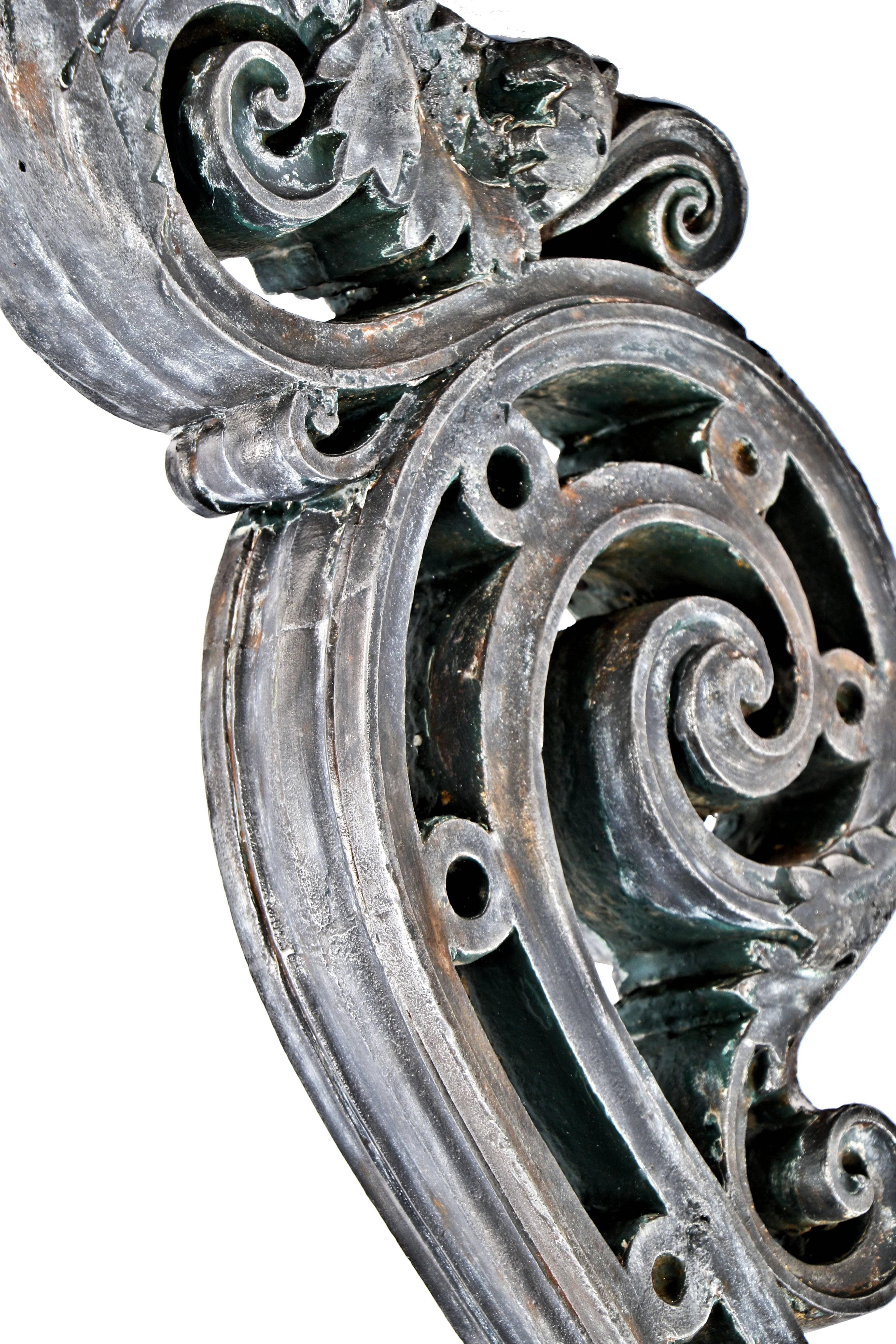 Extravagant, circa 1920s original American oversized ornamental cast iron exterior building facade corbels or brackets salvaged from the historic Downtown Chicago union train station, designed by notable architect Daniel h. Burnham in 1925. The