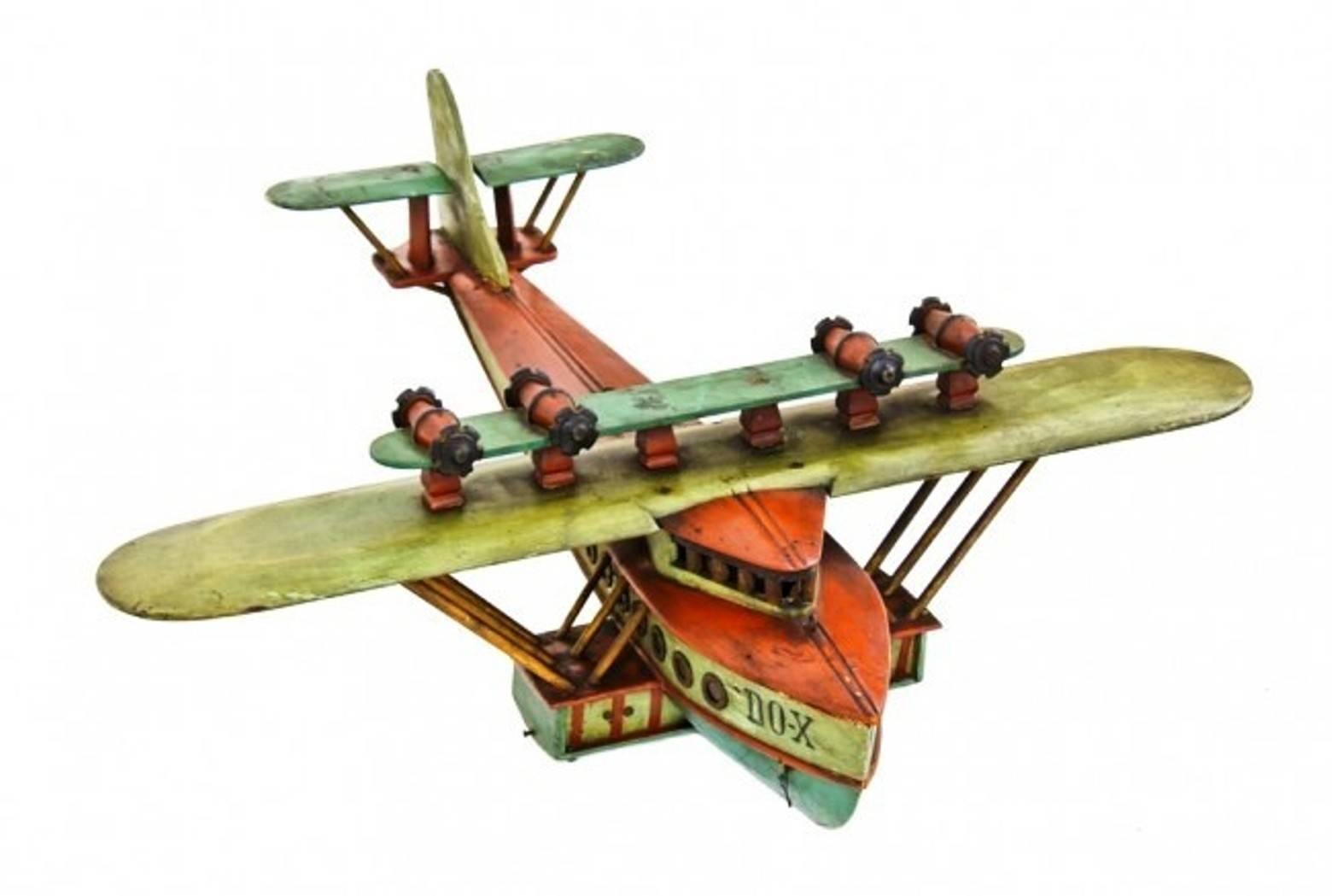Stunning all original, circa 1930s skilfully crafted American Folk Art dornier do x model airplane or flying boat discovered on the south side of Chicago. Very little is known about the Chicago-based artist who created this remarkably detailed
