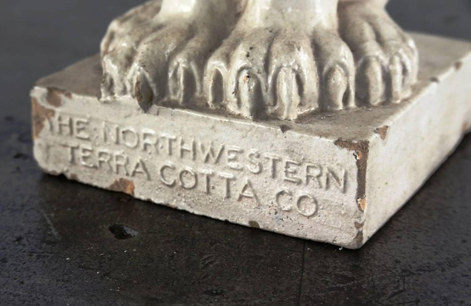 Seldom found original and intact early 20th century white glazed figural terra cotta freestanding rearing lion diminutive statue fabricated as an advertising piece by the northwestern terra cotta co., Chicago, ill. The figural statue's design is