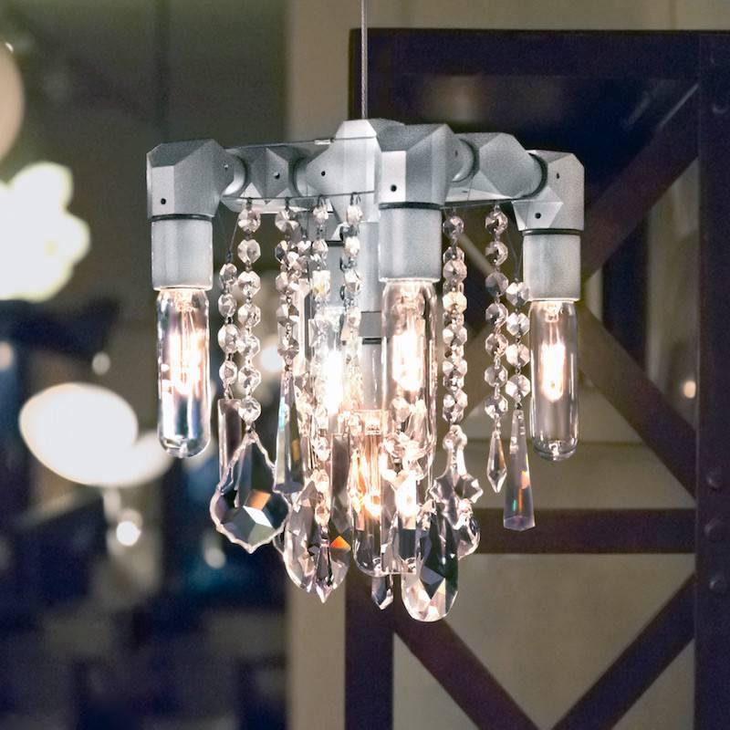 The Bryce compact pendant chandelier (8” x 8”) is an aluminum update of our steel pipe Industrial collection compact chandelier, a modern Industrial blow-torch of light and crystal, suitable for a variety of interior design applications.