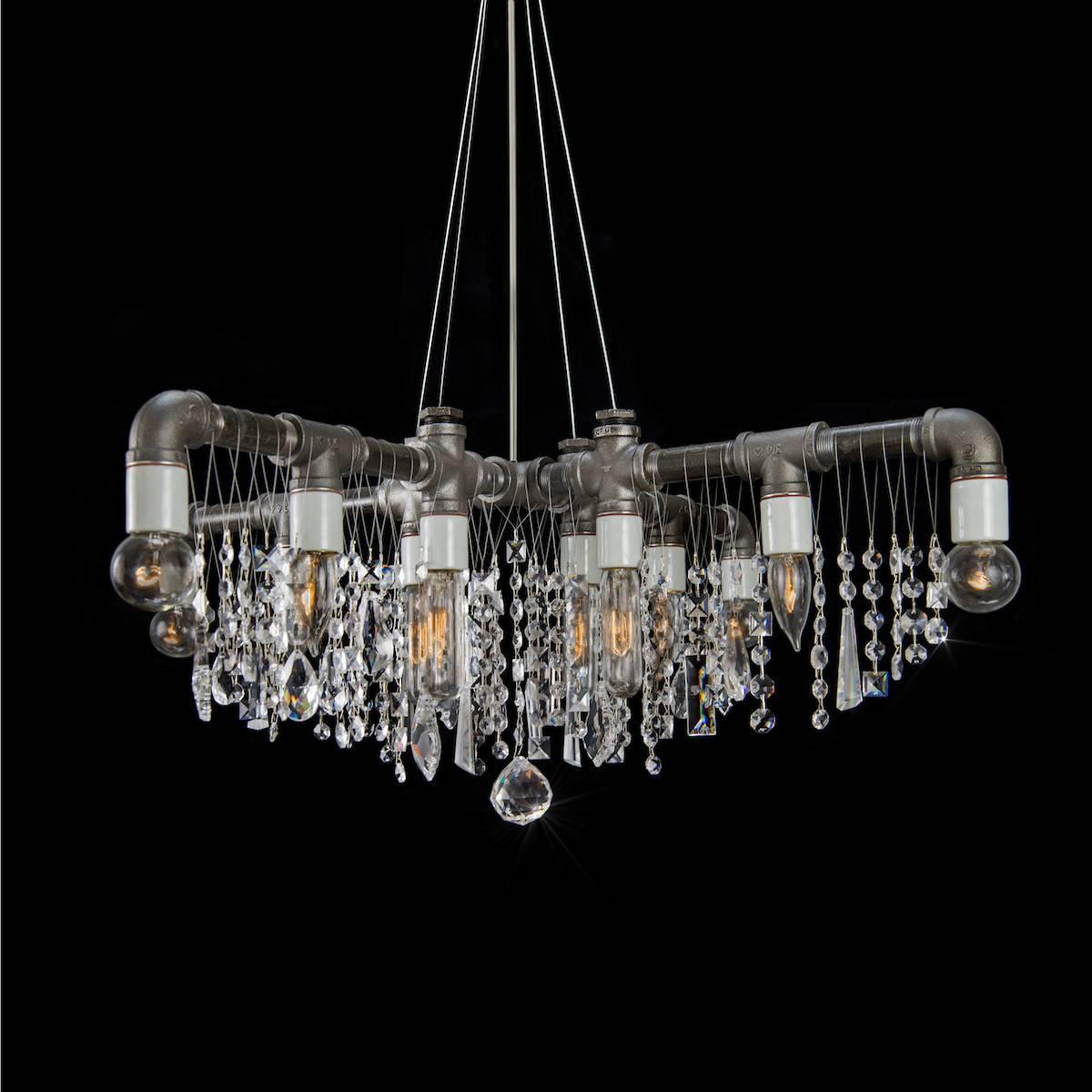 The Industrial collection X-chandelier is a larger, fancier and grander version of our Tribeca X-chandelier and features 100% all-Swarovski crystal. “X” quite literally marks the spot for any room or vignette where the emphasis is on