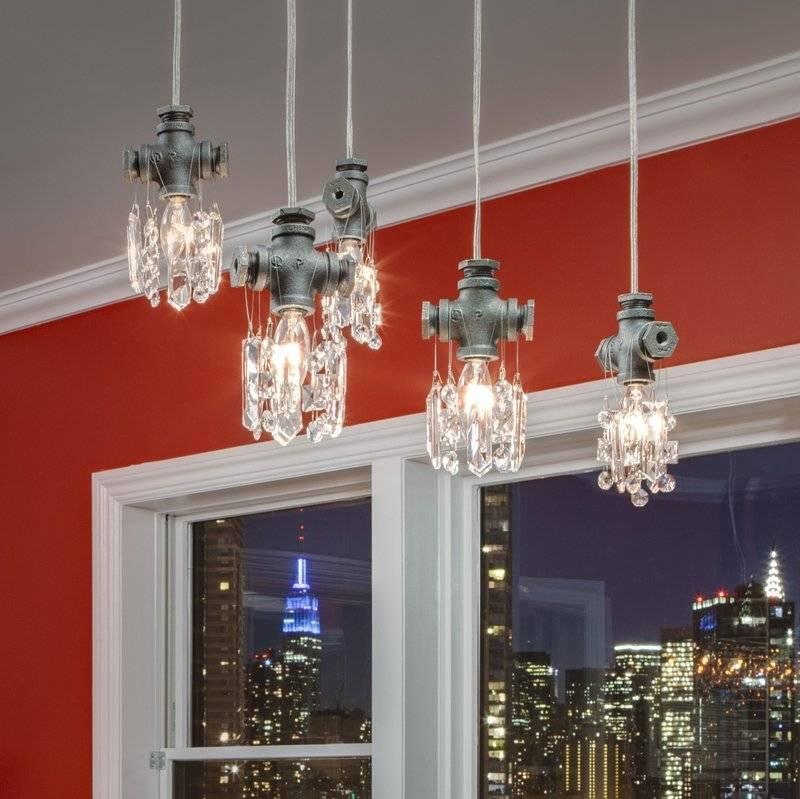 The Tribeca Collection Crystal Chandelier Mini-Pendant is a jewel of artistic modern Industrial-chic lighting. This contemporary pendant can be hung from any perch and is ideal in clustered groups at different elevations. Made with rough industrial