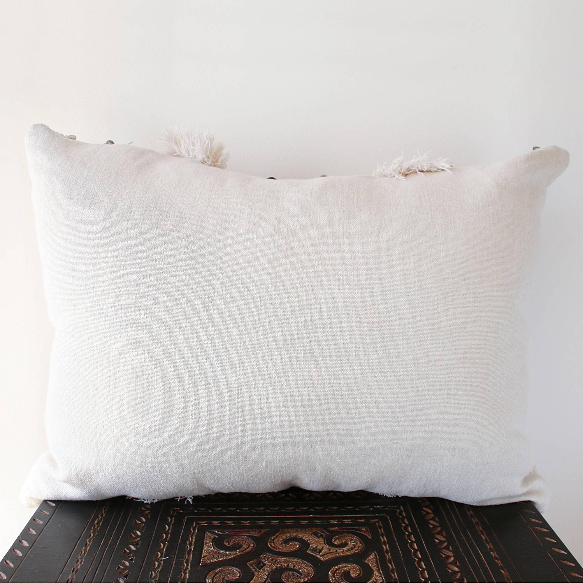 Handira is the Moroccan name for what is commonly referred to as a Wedding Blanket and is a traditional and symbolic textile. We have sourced pristine blankets in Morocco and repurposed them into sumptuous luxe pillows. Backed with soft Belgian