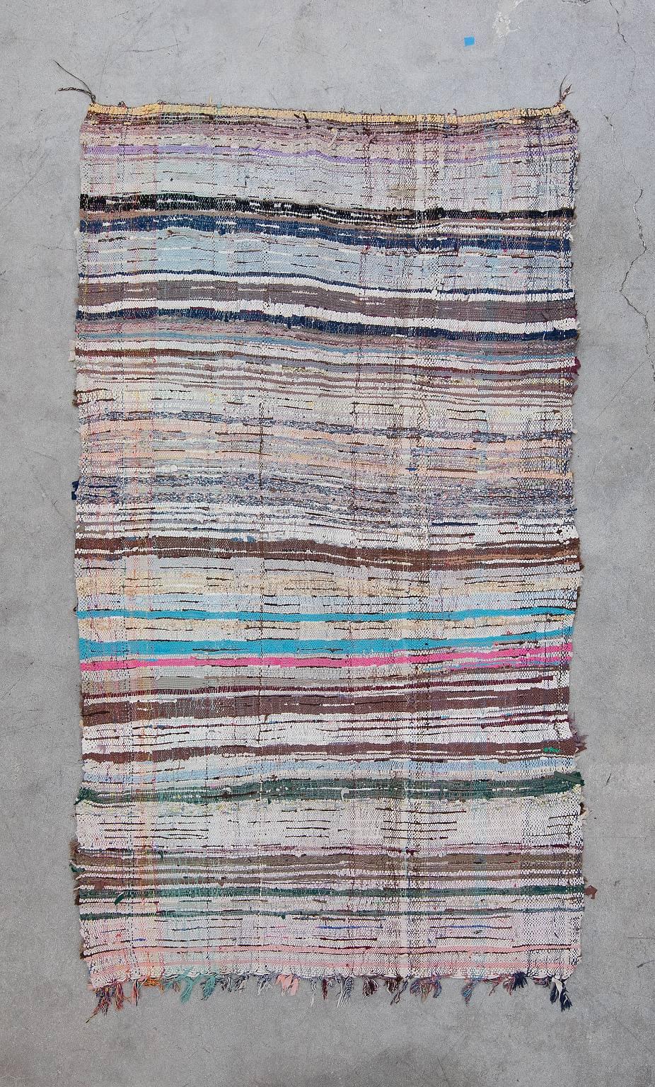 The Ourika valley is located south of Marrakech along the northern slopes of the High Atlas. Typically made for the warmer more private areas of the home, Ourika rugs tend to have a soft, blanket-like, character.

This rug is a true stunner with