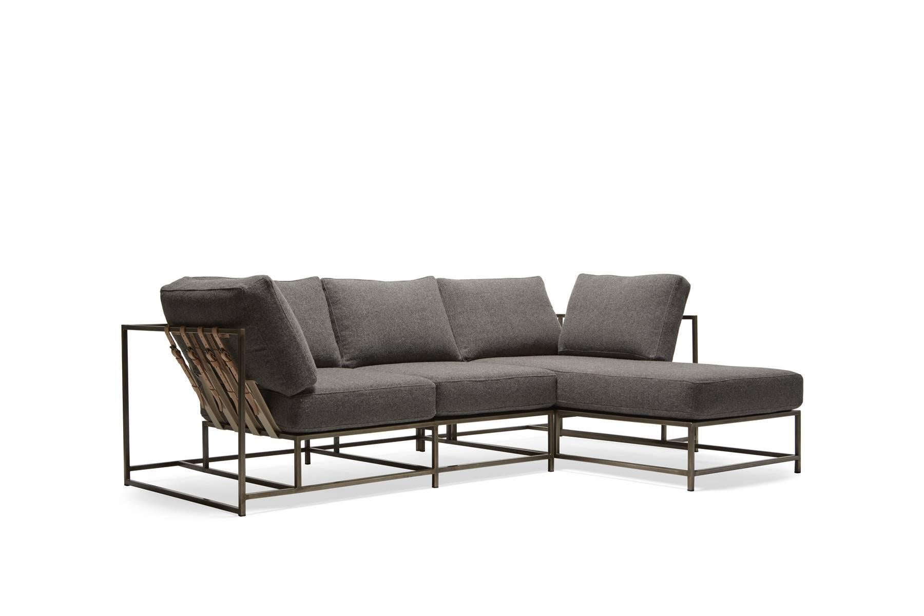 Mini sectional! This one has grey wool upholstery and an antique nickel frame finish. The belts are made with natural cotton webbing, veg tan leather and antique nickel buckles. This design is made in two pieces that are connected with a leather