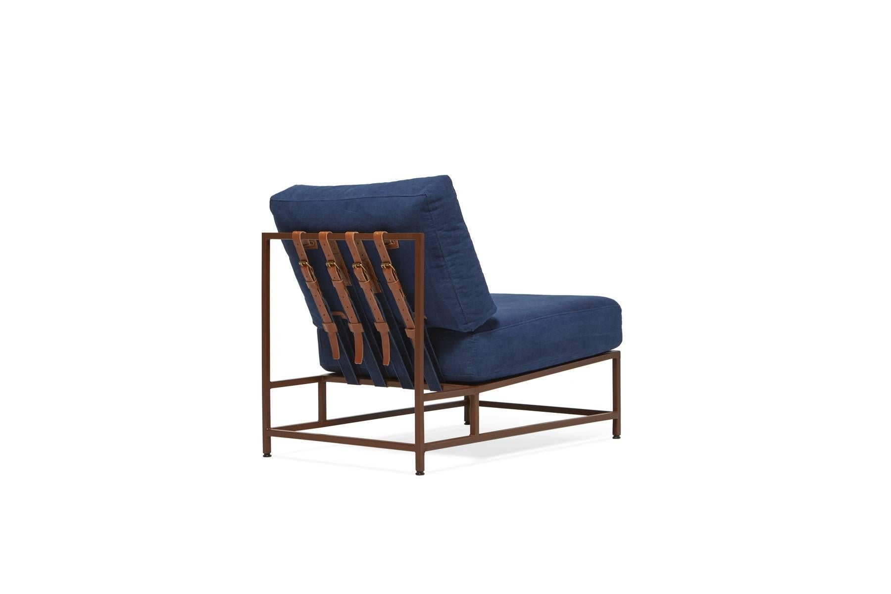 Sleek and refined, the Inheritance Chair is a great addition to nearly any space. 

Inspired by a worn-in pair of jeans and created alongside the team at Simon Miller, USA, our indigo cotton canvas is hand dyed using a chemical free process and