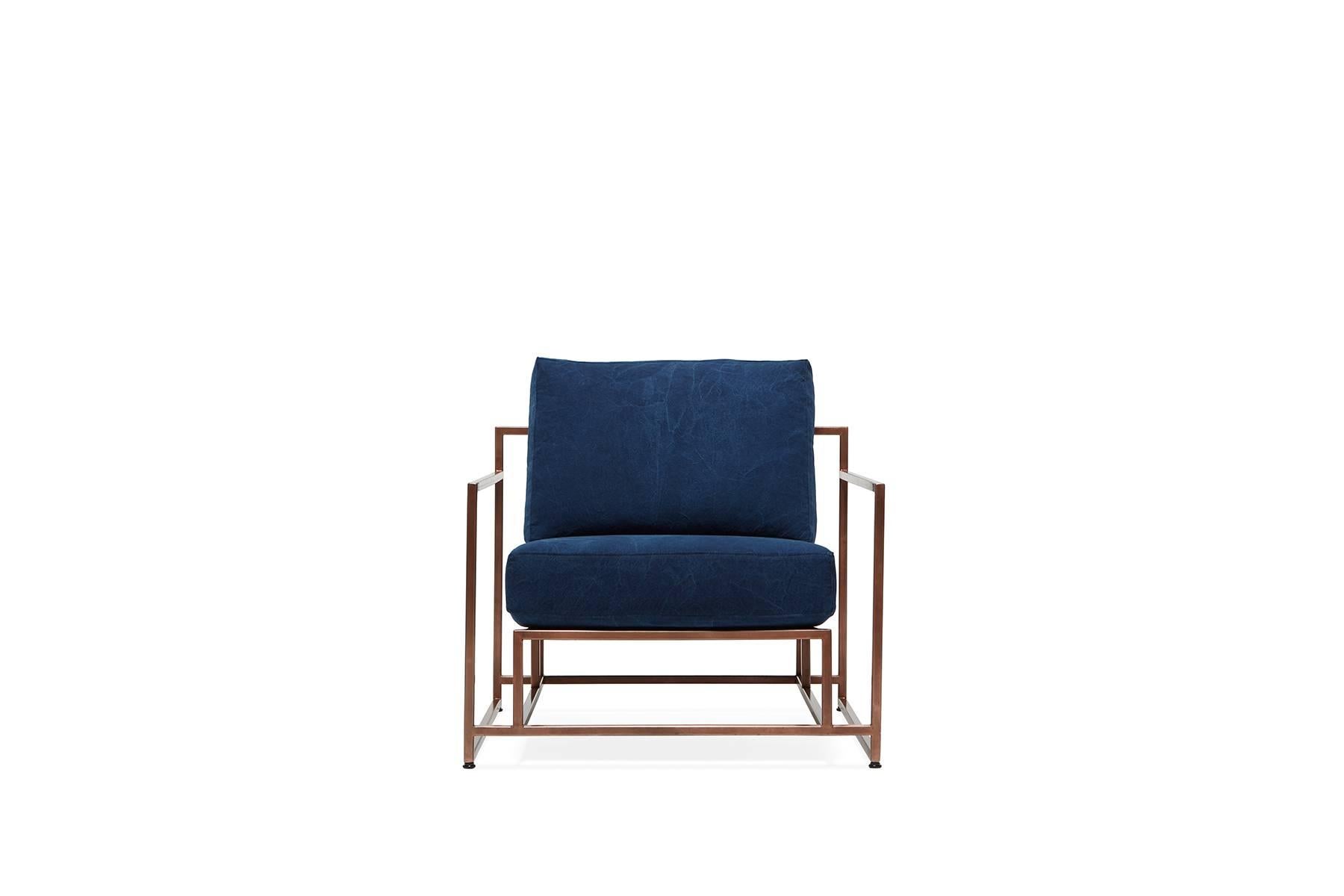 The Inheritance Armchair by Stephen Kenn is as comfortable as it is unique. The design features an exposed construction composed of three elements - a steel frame, plush upholstery, and supportive belts. The deep seating area is perfect for a