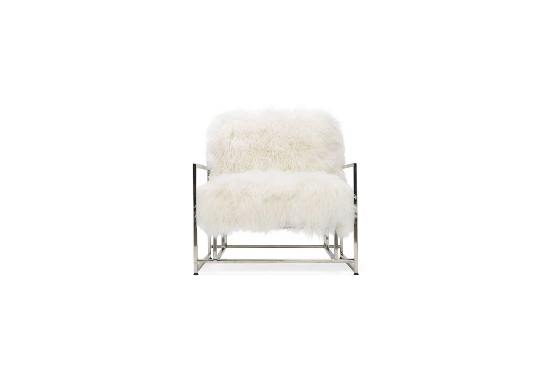 This ultra luxurious version of The Inheritance Collection Armchair has super soft white Mongolian sheepskin upholstery, black webbing and leather belts, and a polished nickel frame finish. Ottoman is sold separately, inquire within.

This item is