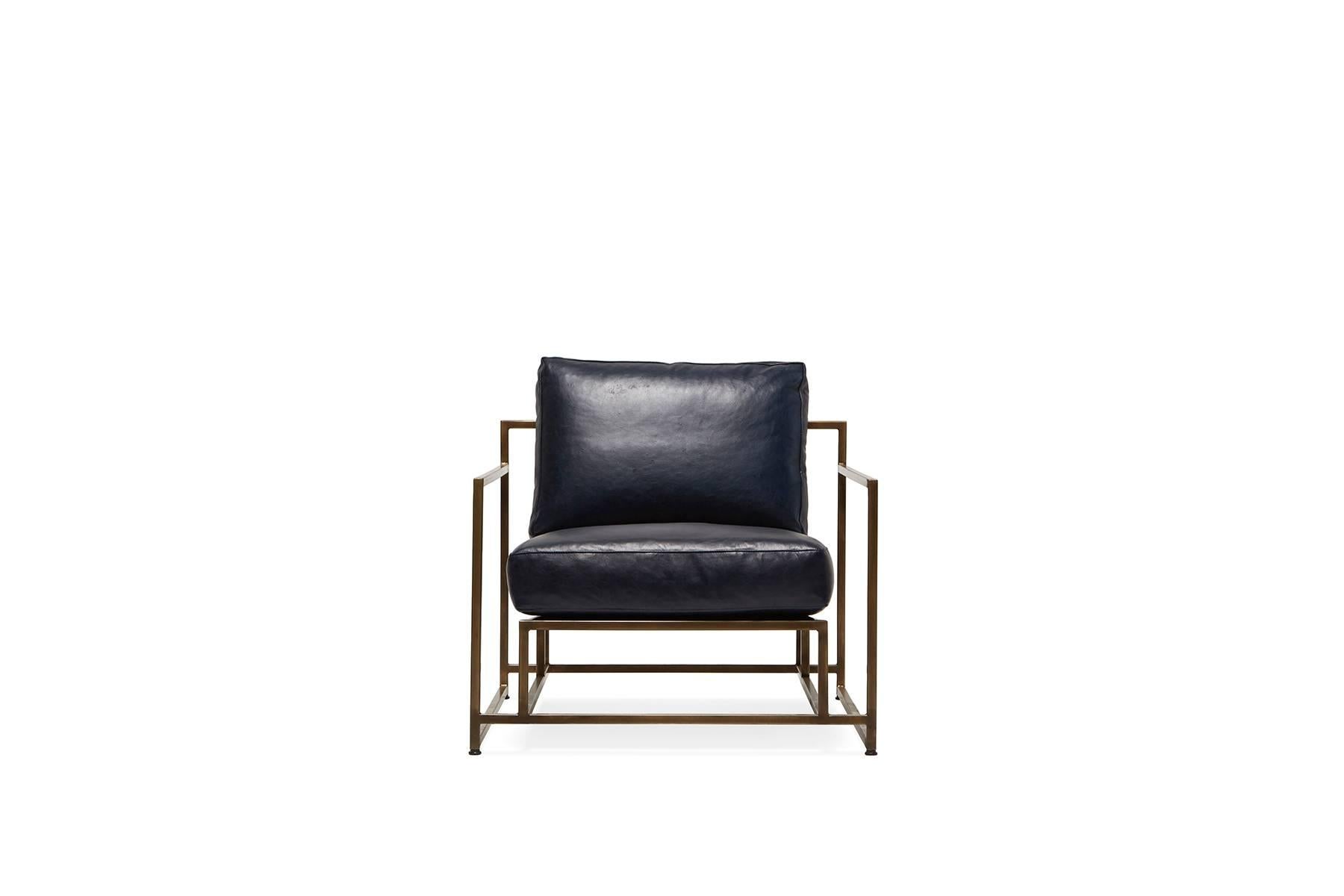 A new chair in our leather series, this version of the Inheritance collection chair has Indigo leather upholstery atop an antique brass frame with natural cotton webbing, matching Indigo leather belts, and antique brass buckles

This item is made