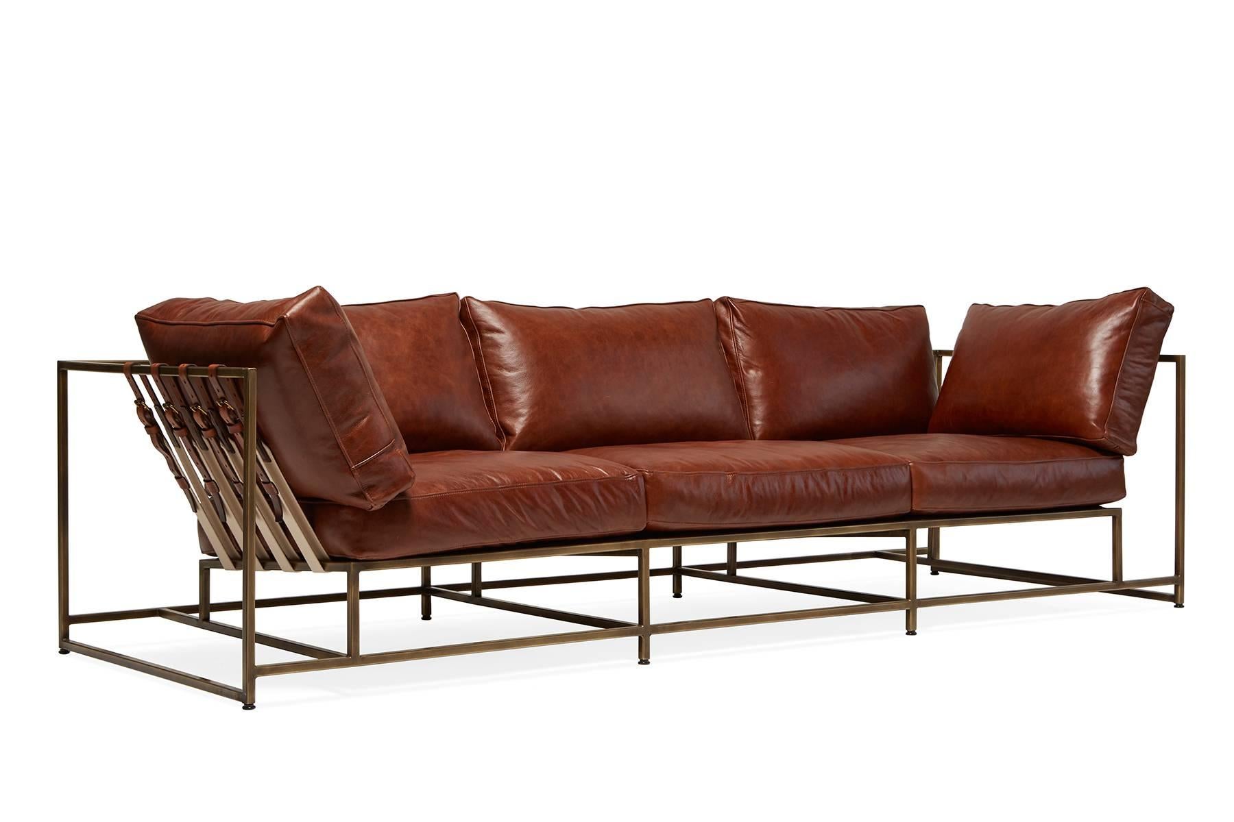 The Inheritance Sofa by Stephen Kenn is as comfortable as it is unique. The design features an exposed construction composed of three elements - a steel frame, plush upholstery, and supportive belts. The deep seating area is perfect for a relaxing