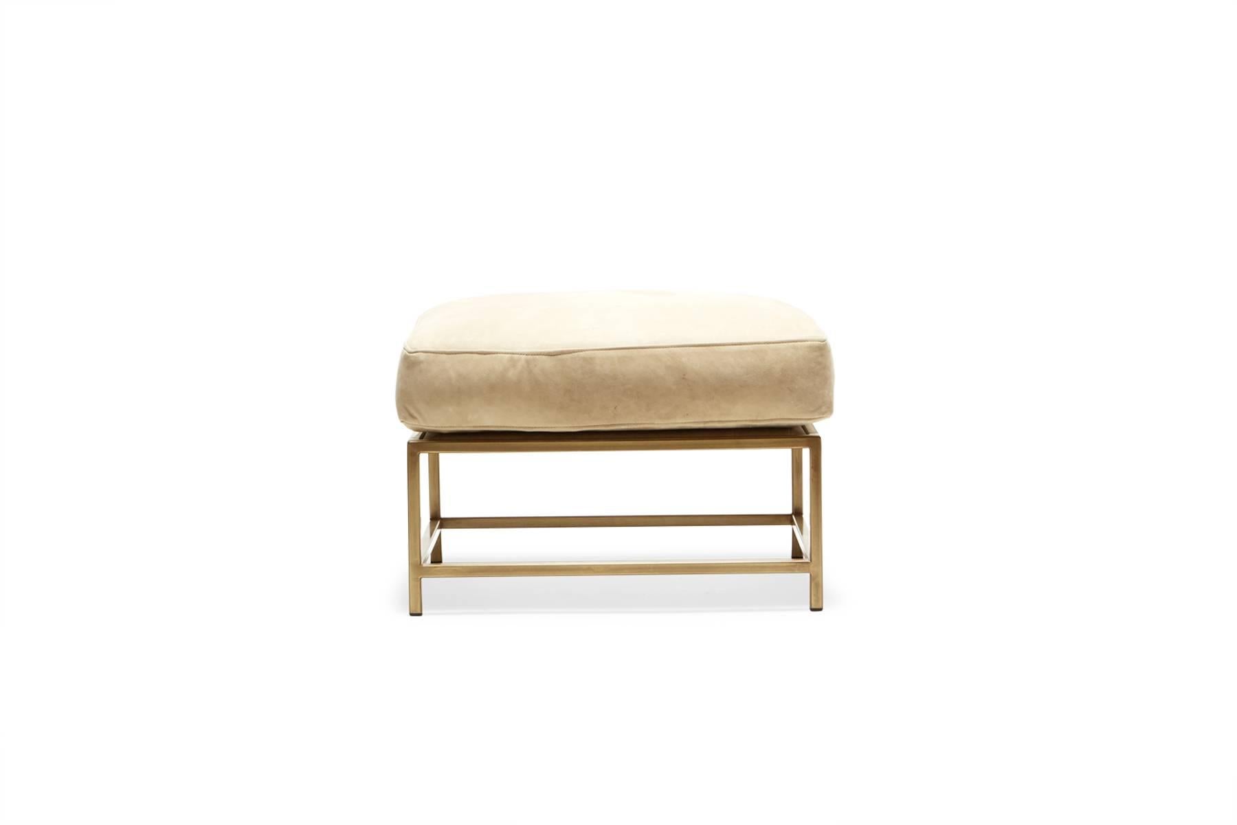 leather and brass ottoman