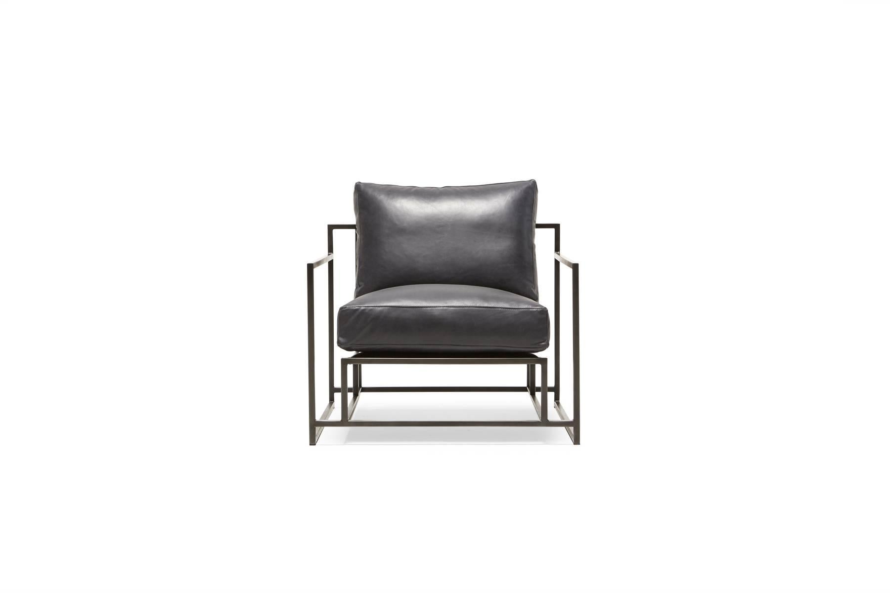 The Inheritance Armchair by Stephen Kenn is as comfortable as it is unique. The design features an exposed construction composed of three elements - a steel frame, plush upholstery, and supportive belts. The deep seating area is perfect for a