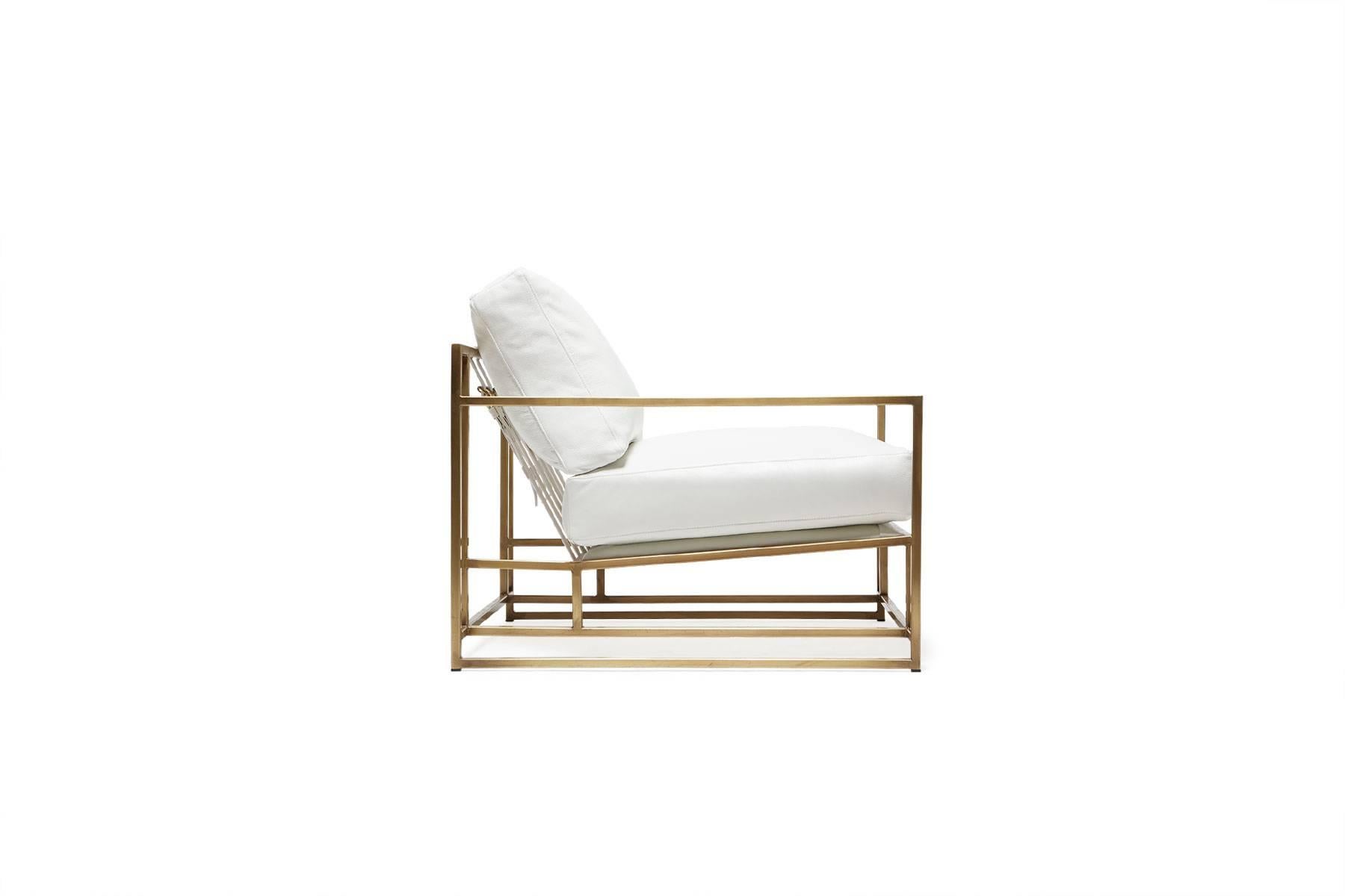 The Inheritance Armchair by Stephen Kenn is as comfortable as it is unique. The design features an exposed construction composed of three elements - a steel frame, plush upholstery, and supportive belts. The deep seating area is perfect for a