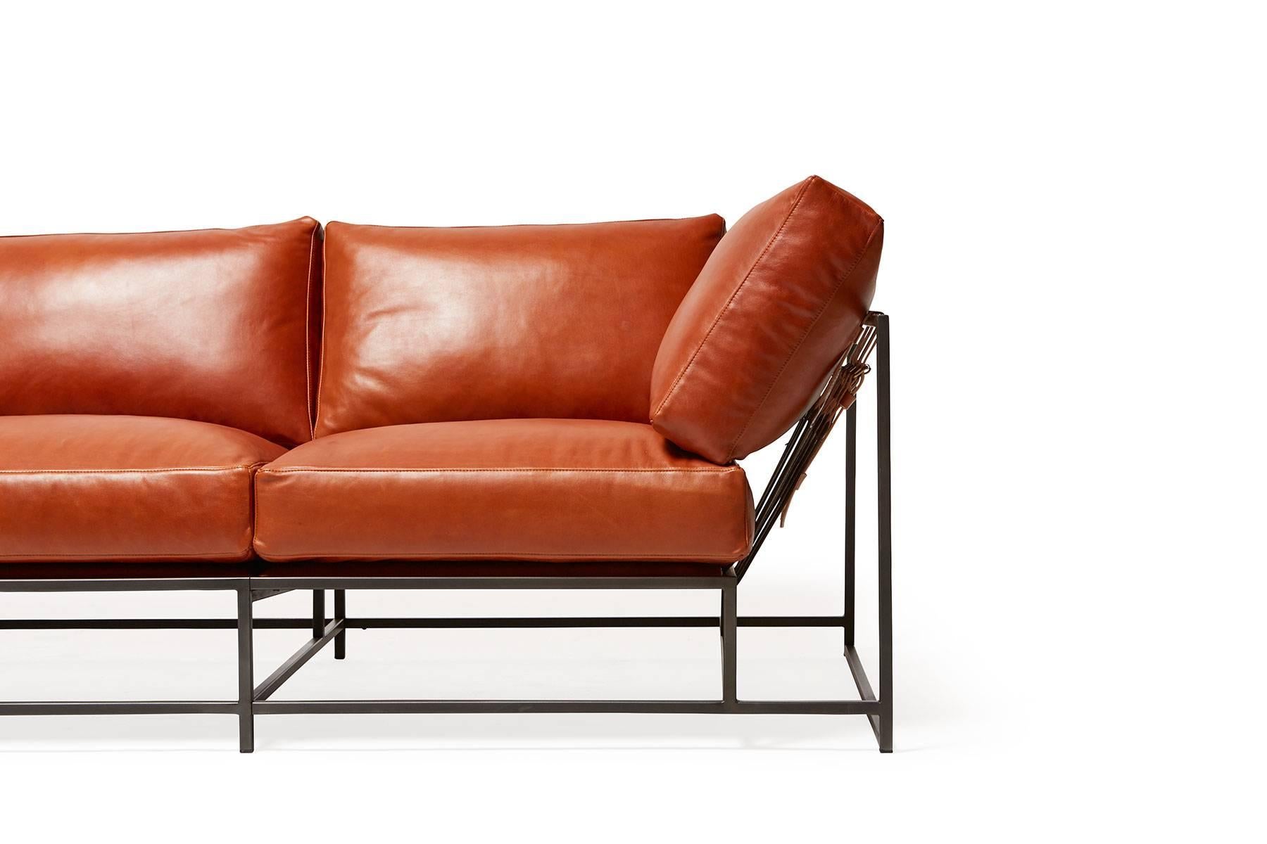 The Inheritance Sofa by Stephen Kenn is as comfortable as it is unique. The design features an exposed construction composed of three elements - a steel frame, plush upholstery, and supportive belts. The deep seating area is perfect for a relaxing