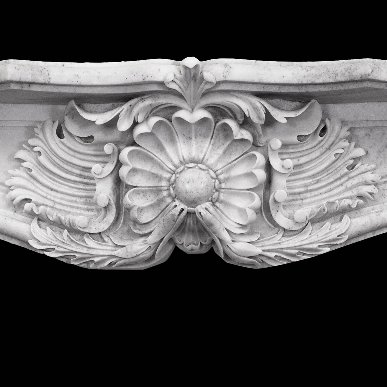 Unique English Rococo Louis style Carrara marble mantel. Impressively hand-carved solid marble fireplace.
Belived to be made late 20th Centrury.

Shelf Width 77