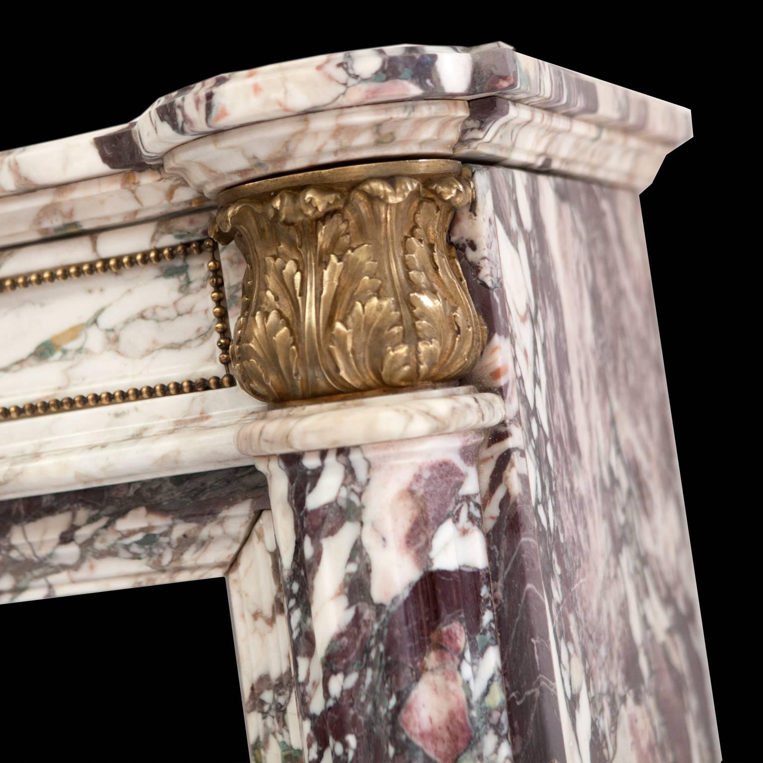 19th Century Antique Empire Rare Breche Marble Fireplace Mantel With Guilt Ormolu Mounts And Acanthus Leaf Capitals.