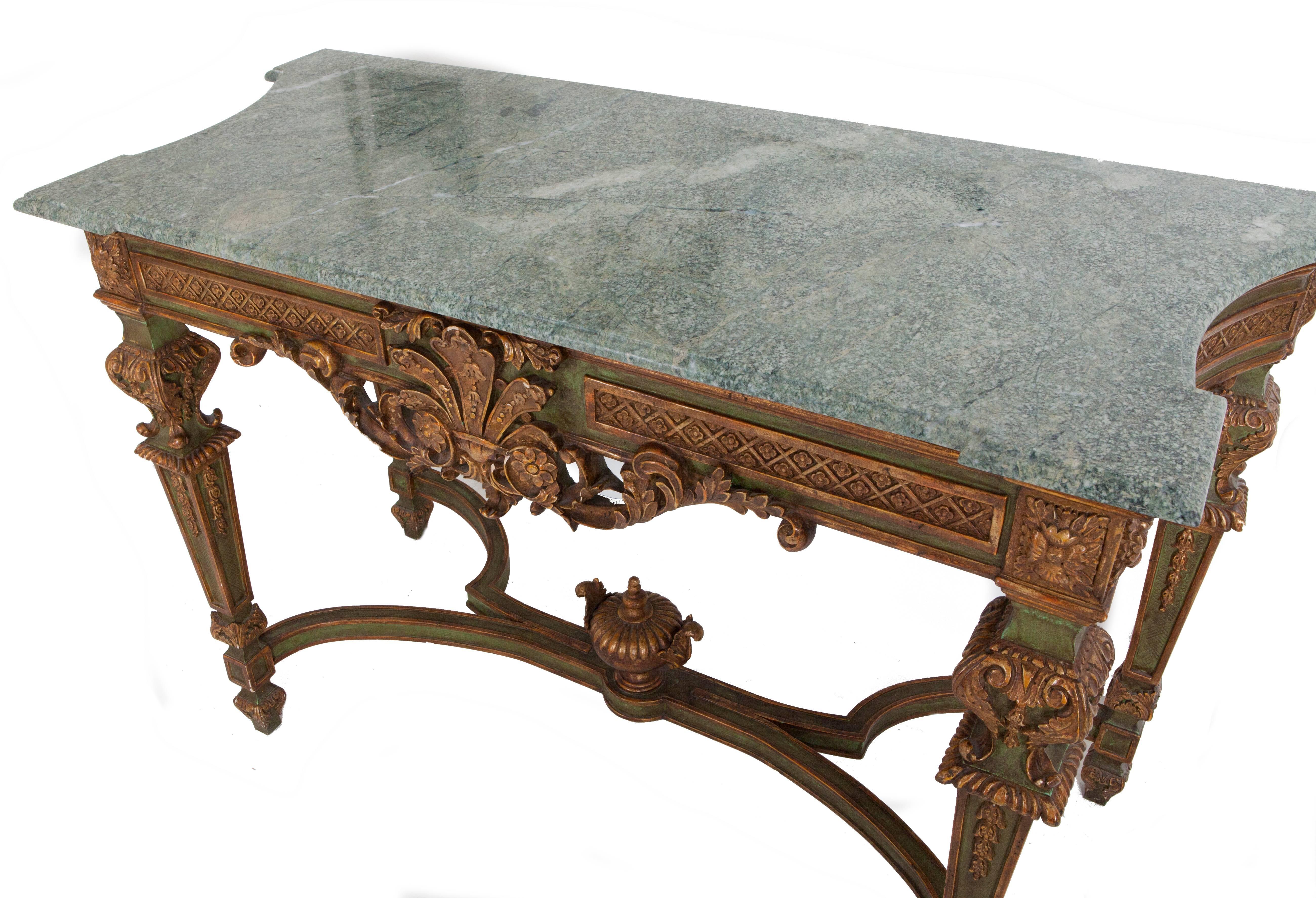 20th century French hand-painted and gilt empire style Verde marble topped console table. Significantly hand-carved with fleur-de-lis, swags and urns