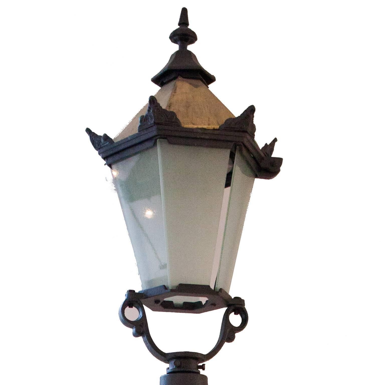 Unique pair of mid-late 20th century fluted with decorative pattern 
Cast-iron street lamp posts and large square brass lantern 
(8ft 2inch) (2.5m)

These magnificent street lamp posts come with a cast-iron and brass lantern which are polished
