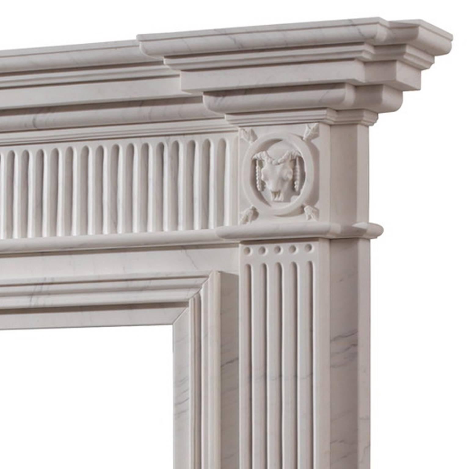 Unique fireplace produced under license from Kenwood House Hampstead, London. This modest, well proportioned and dignified creation in imperial white statuary marble takes its inspiration from the chimney-piece in the entrance hall at Kenwood house.
