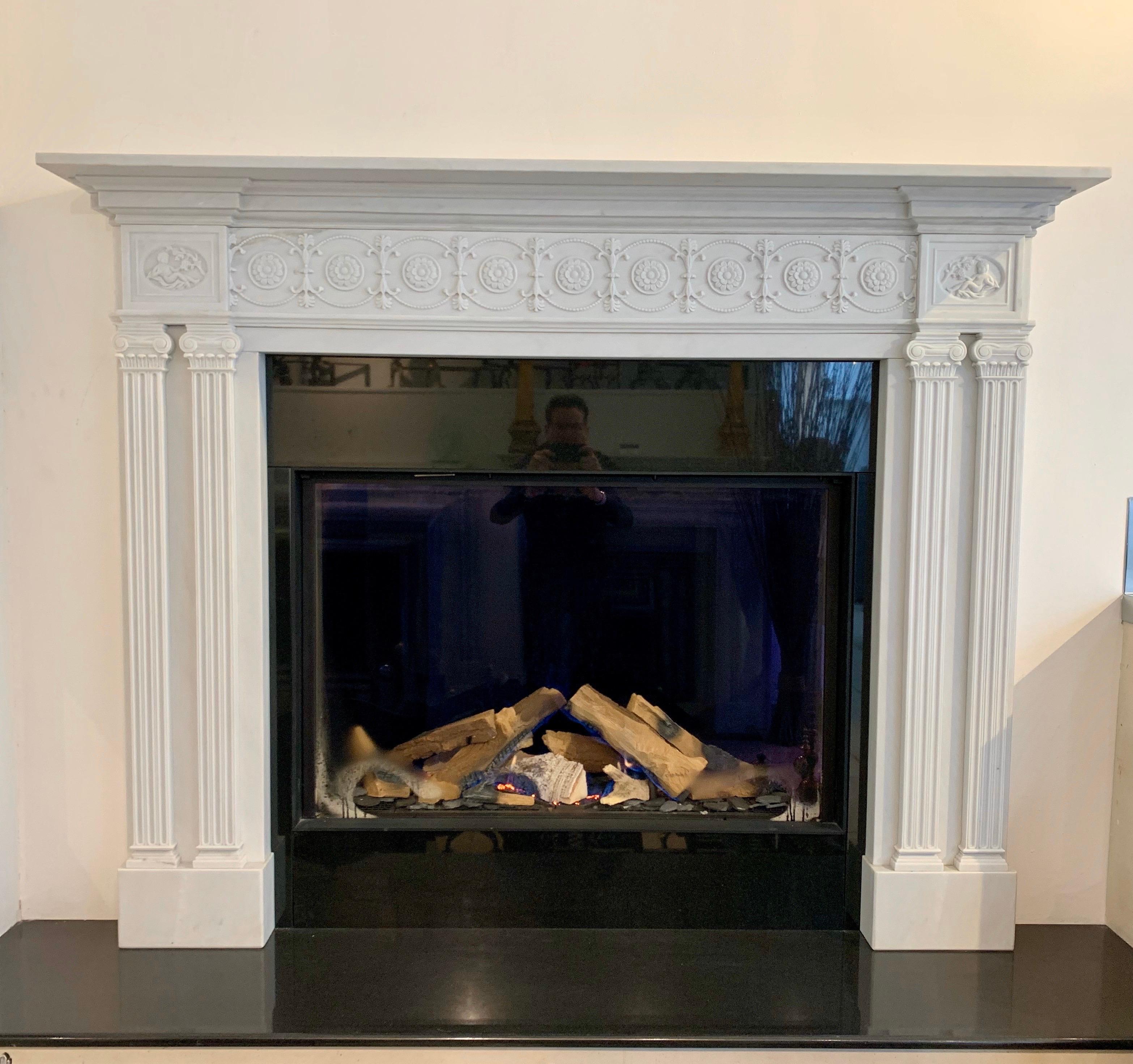 Unique fireplace produced under license from kenwood house hampstead, London. By acquisitions for its recent heritage collection.
A marvel in marble, this unusual chimney-piece is inspired by a mid-1790s original in the middle bedroom at kenwood