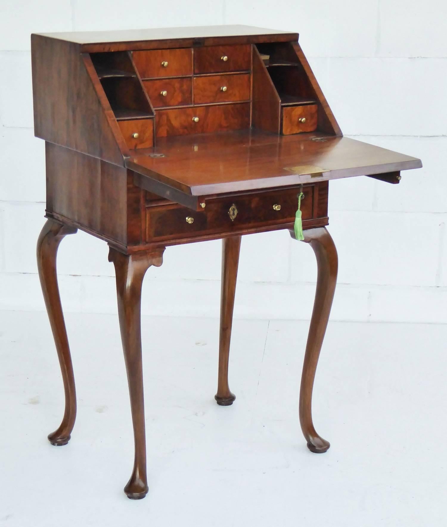 For sale is a Late Victorian walnut ladies bureau in lovely condition having been fully restored and hand polished. The fall pulls down to sit on two pull-out slides and to reveal four small drawers above a single drawer to the centre with a small