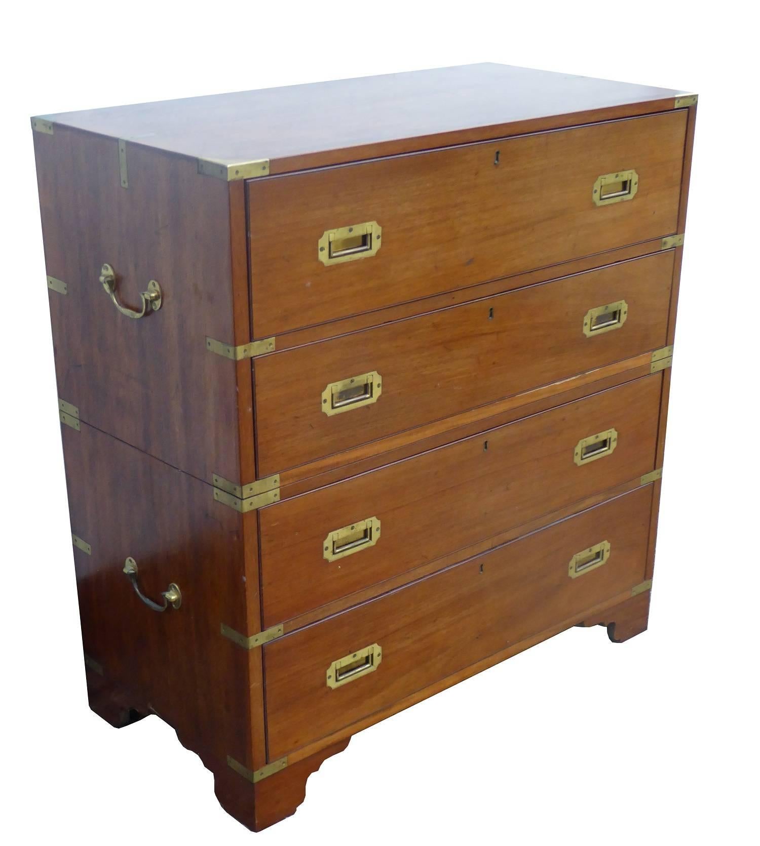 For sale is a good quality Victorian mahogany campaign secretaire chest. The chest has a single drawer at the top with a fall front, opening to reveal a fully fitted interior comprising of pigeon holes and drawers as well as a leather writing