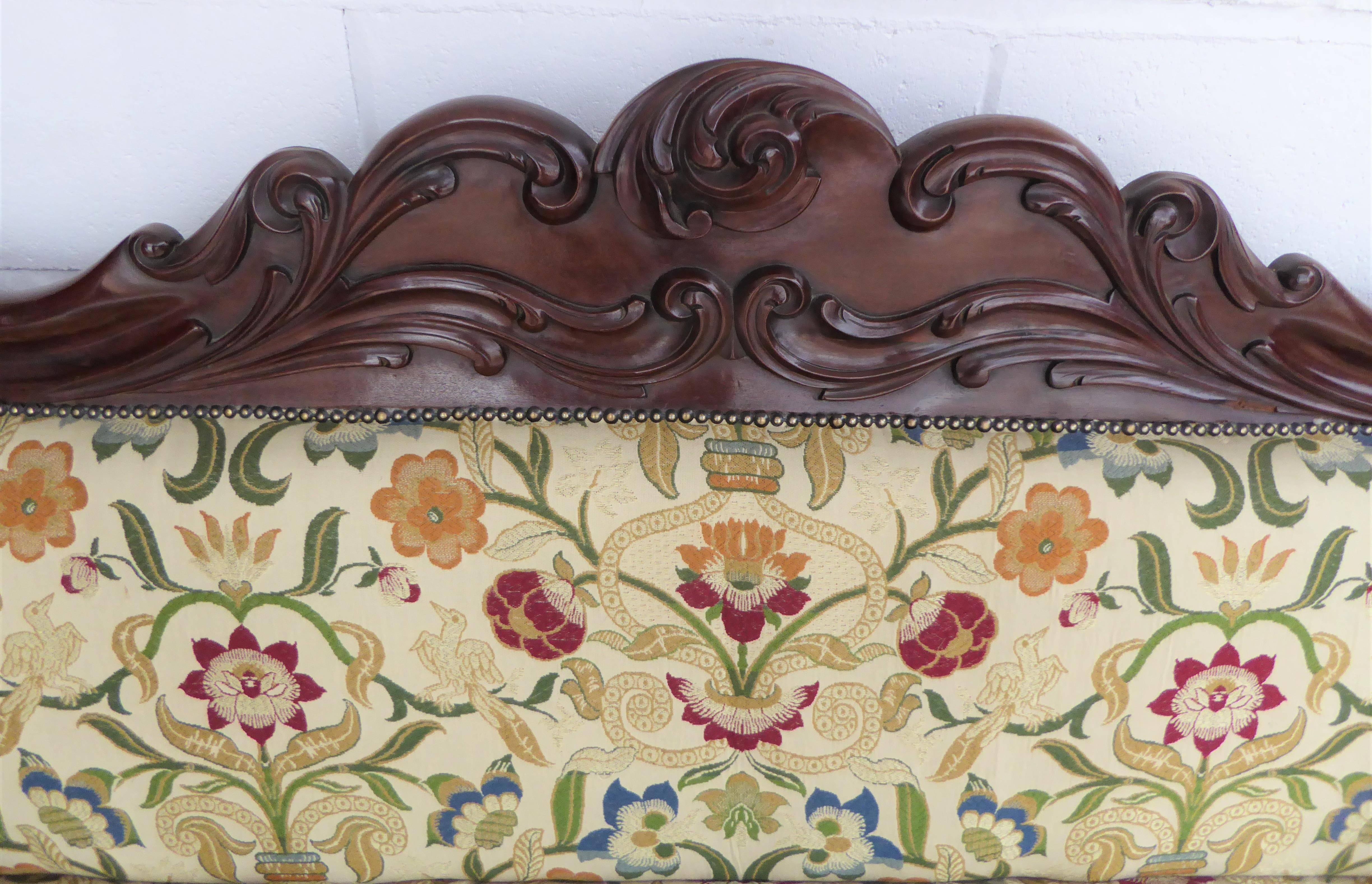 
Early Victorian mahogany carved four-seat sofa in very nice condition, the sofa is structurally sound with a very nice good quality Tapestry upholstery attributed to Jim Dickens in very good condition. The sofa has a nicely carved back with carved