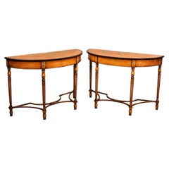 A Fine Pair of Sheraton Revival Painted Satinwood Demi-Lune Console Tables