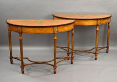 A Fine Pair of Sheraton Revival Painted Satinwood Demi-Lune Console Tables