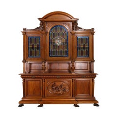 Exceptional monumental Italian Renaissance dining room suite in carved walnut