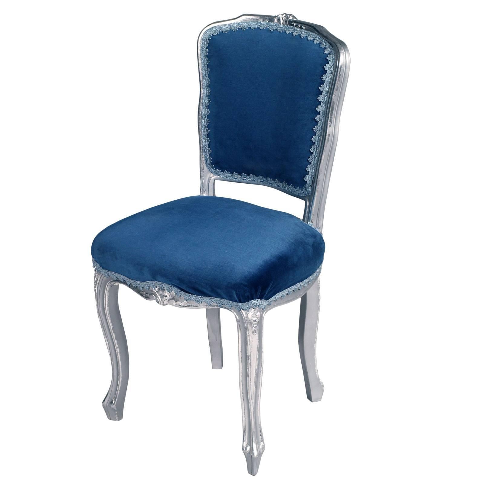 Code: FA41
Elegant Venetian Baroque side chairs in walnut hand-carved and silvered with new blue velvet upholstery.