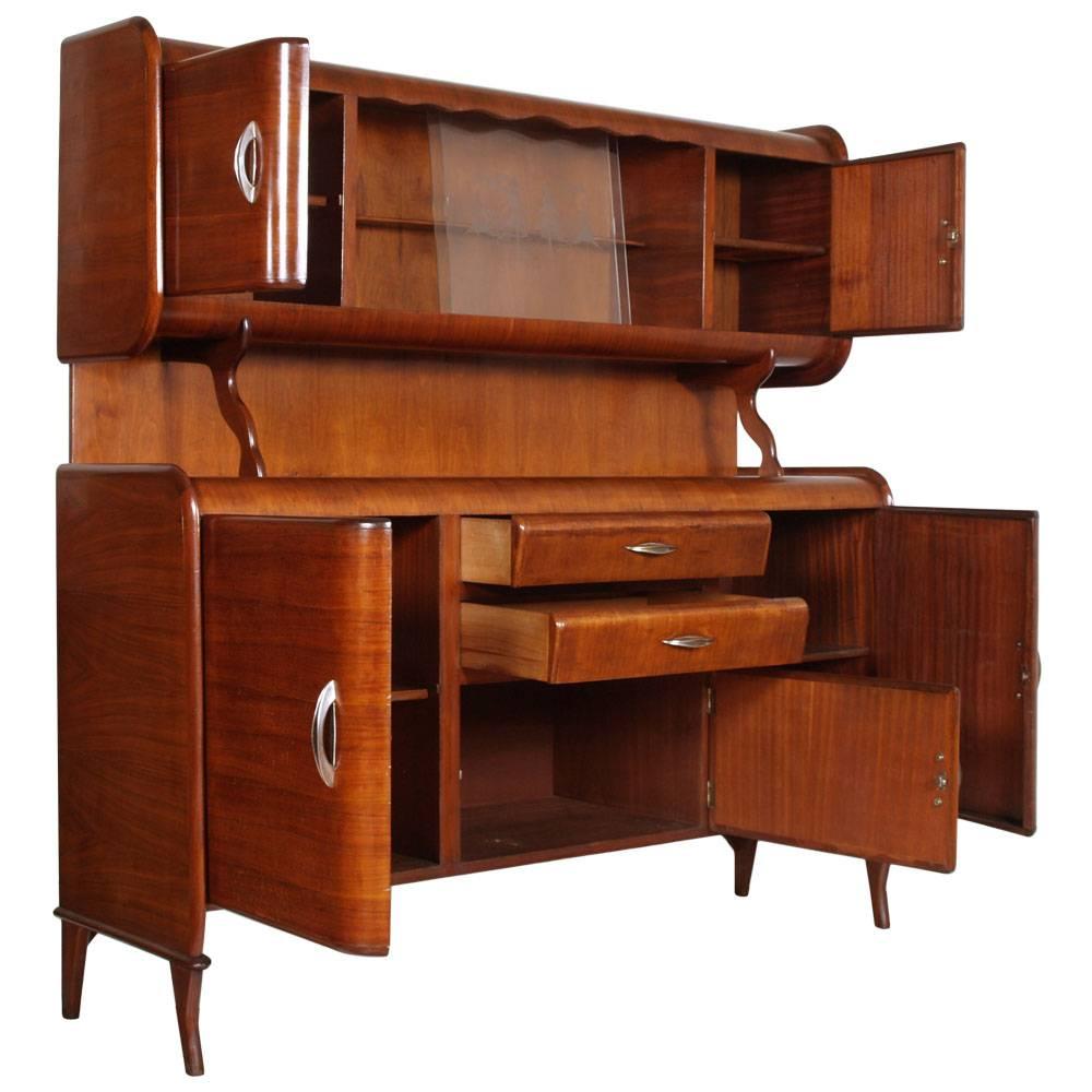 Cupboard two bodies 1940s curved walnut folder, Cantu production by Paolo Buffa designer
Top: Central display case with internal shelf and sandblasted stained glass; two doors with internal shelf; feet moved.
Bottom: with two doors and interior