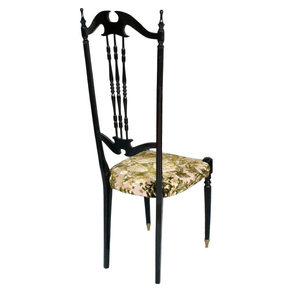 Elegant Mid century modern pair of Chiavari high back chairs, Italy, in ebonized mahogany .  Re-upholstered
Famous interpretation of the Chiavari chair by the great Milan architect Paolo Buffa

Measure in cm: L 41, W 41, H 122/48.