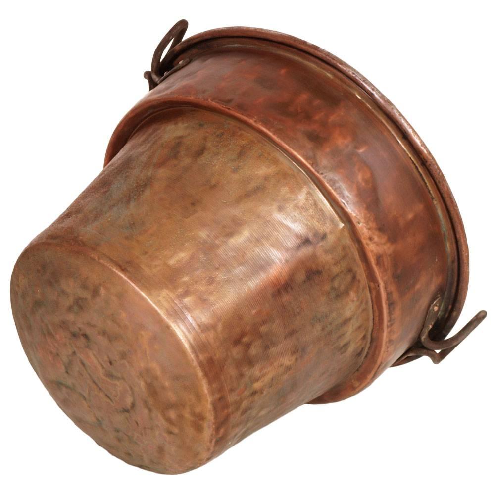 Italy antique solid copper bucket with two carrying handles.

Measure in cm: H 52 x D 63.