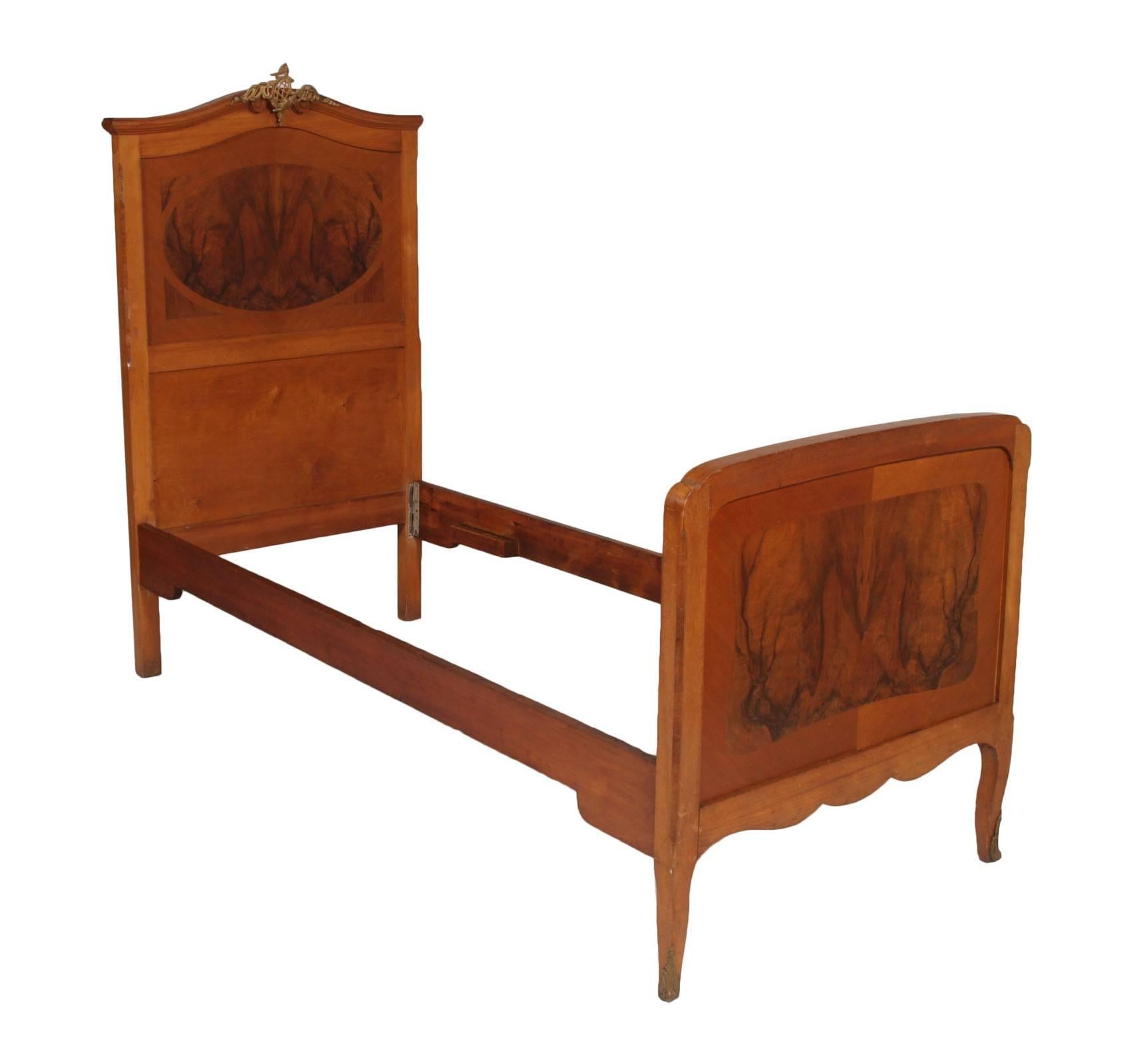 Early 20th century antique Italian Art Nouveau pair of beds in cheerywood and burl walnut with golden bronze adornments

Measures cm: H 160 / 92 W 90  D 210.

A. Meroni & R. Fossati - founded in 1870, it was one of the oldest and most important
