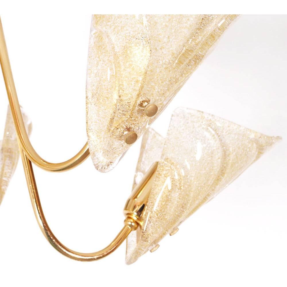 1950s Mid-Century Modern chandelier, six-light, Murano glass leaves by Carlo Nason for Mazzega
The six leaves are molded and fused with clear and dark amber glass splashes. 
The supporting structure of gold-plated brass. 
The chandelier has been