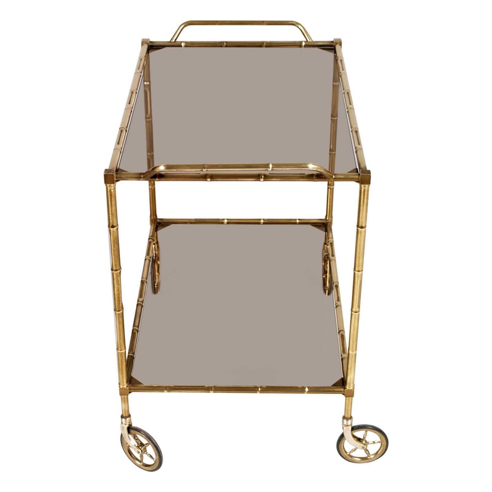 Elegant original Art Deco trolley bar cart in gilt brass 
