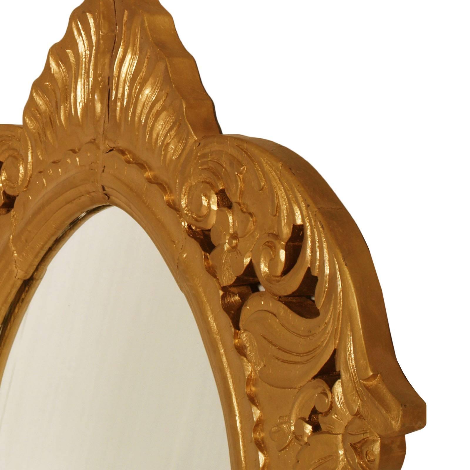 miroir baroque arabe massif du 18e siècle, sculpté à la main, bois doré

Mesures cm : H 105 x L 85 x P 3.