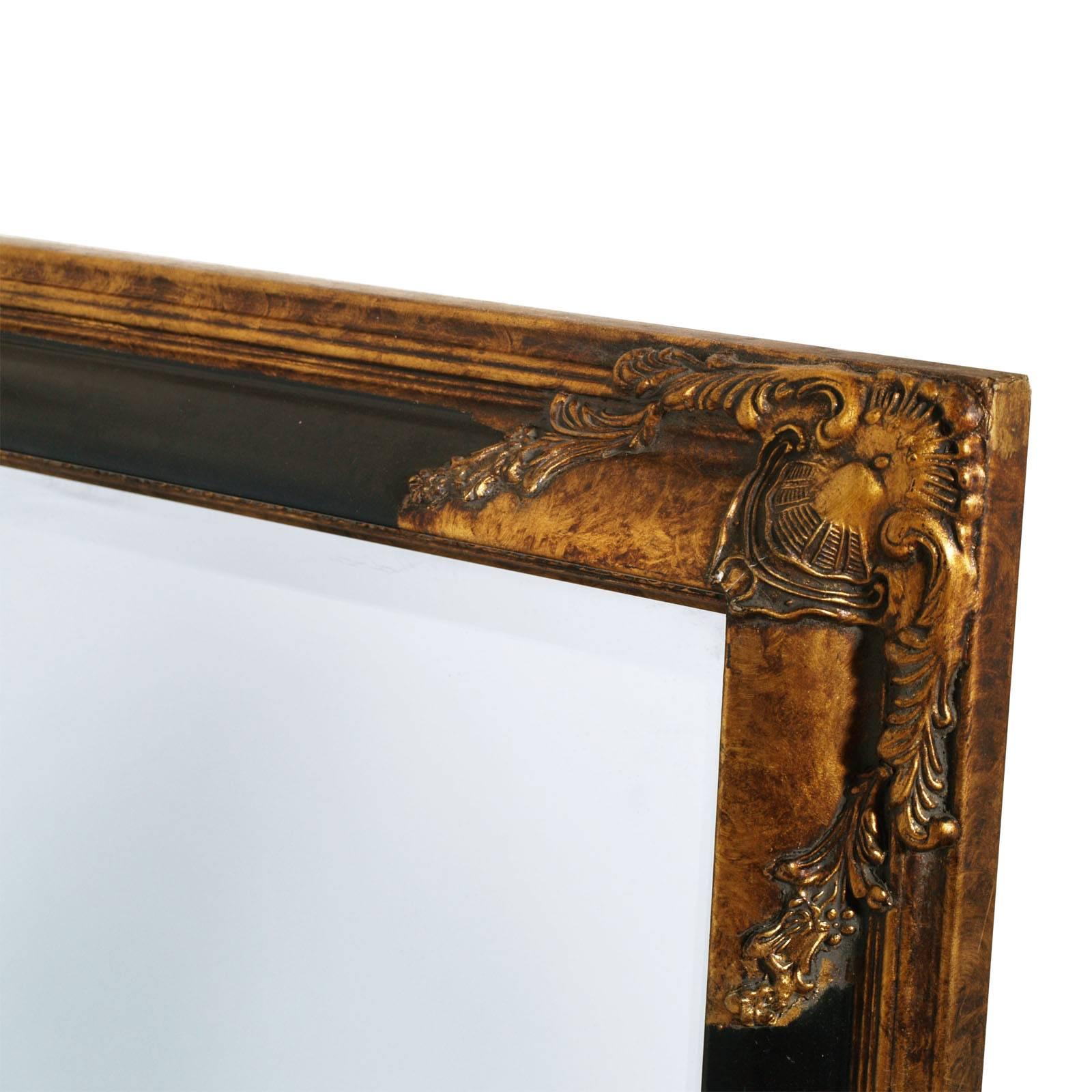 Art Deco mirror with carved golden black frame of the Florentine craftsmanship, circa 1940.
Measure cm: H 75 x W 65 x D 4.
 