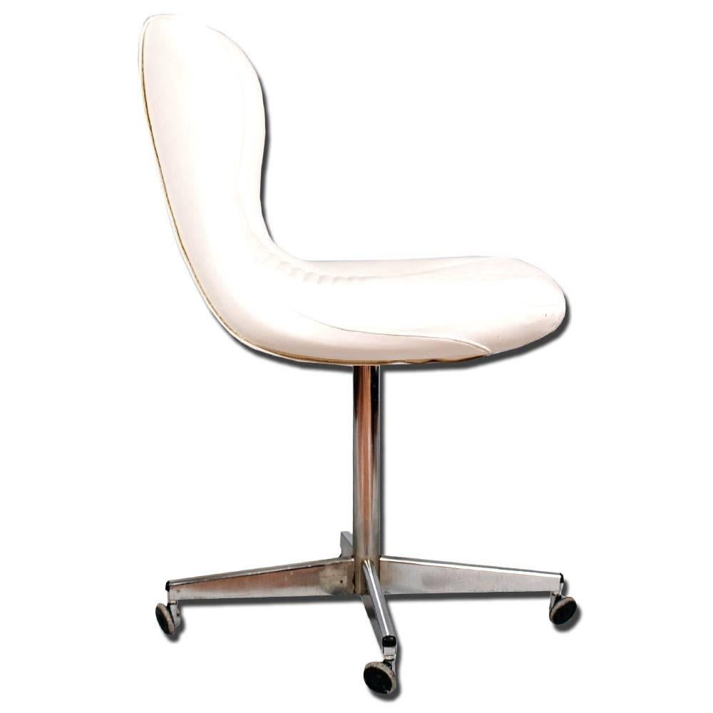 Italian revolving easy-chair, chromed steel, white real leather by  Gastone Rinaldi per RIMA, in good condition.
Measures cm: H 85\50 x W 47 x D 58.

ABOUT Gastone Rinaldi
Gastone Rinaldi was born in Padua in 1920, and graduated in accounting at the