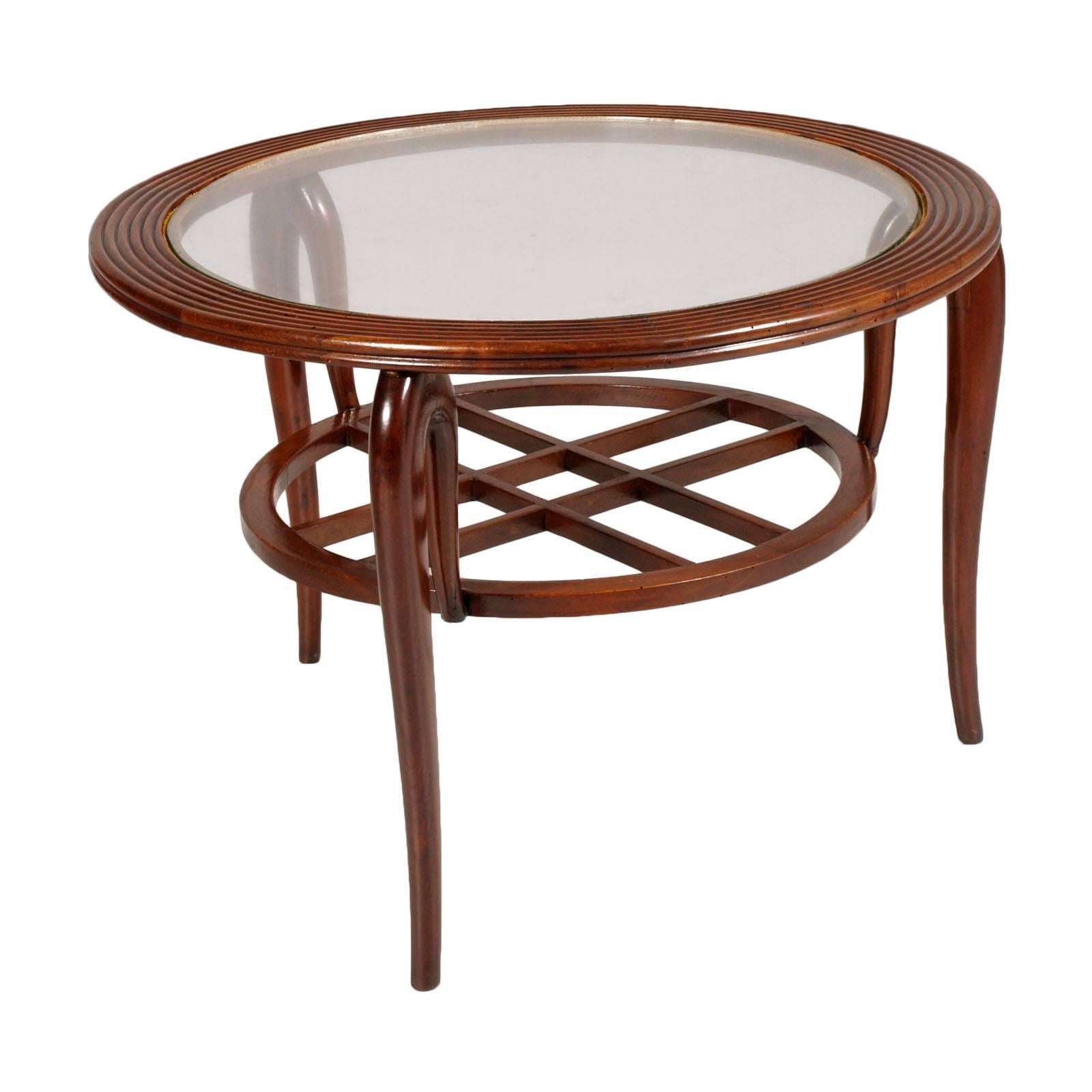 1940s Mid-Century Art Deco coffee table by Paolo Buffa in walnut with glass top , restored and polished to wax.

Measure cm: H 48 x D 68.