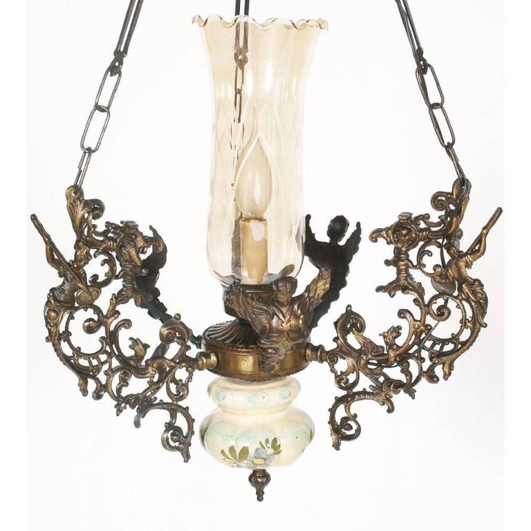 Art Nouveau Chandelier In Bronze Hand Painted Bassano Ceramic And Austrian Art Nouveau Chandelier In Bronze Hand Painted Bassano Ceramic And Murano Glass For