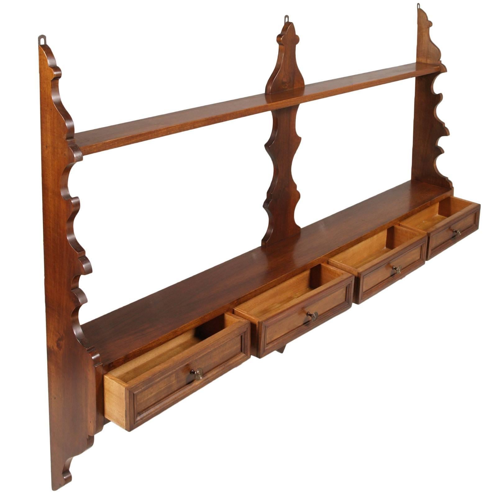 An excellent Mid-Century Italian Tyrolean kitchen shelf or plate rack, with four drawers in massive blond walnut,  wax polished.
A very useful item for your kitchen, tavern, country house or house at the sea

Measure cm: H 102 x W 160 x D 18.