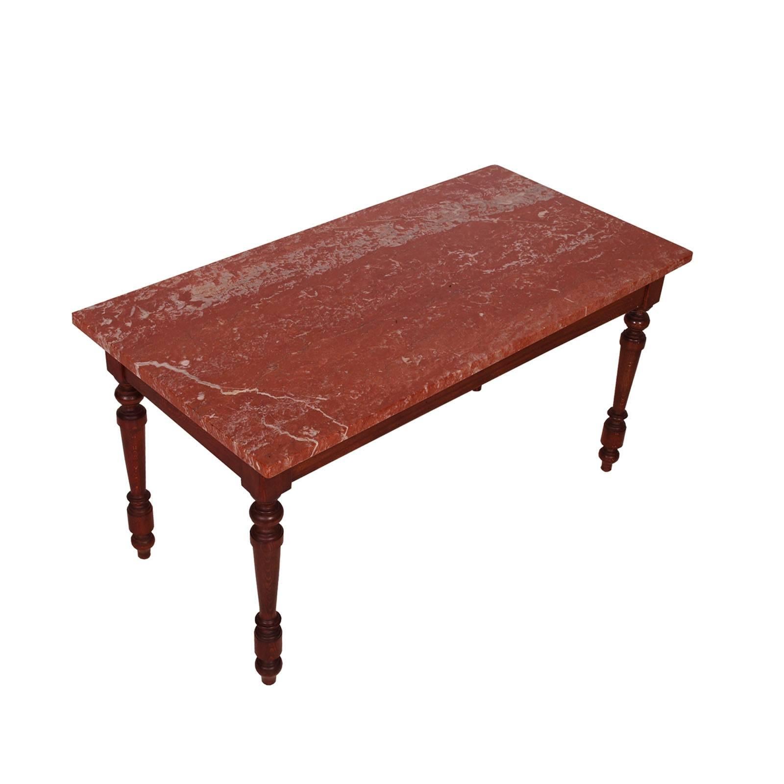 Early 20th century coffee centre table Renaissance style with top Verona's red marble by Ebanisteria Bovolone.
In solid walnut, restored and wax polished

Measure cm: H 48 W x 100 x D 50.
 