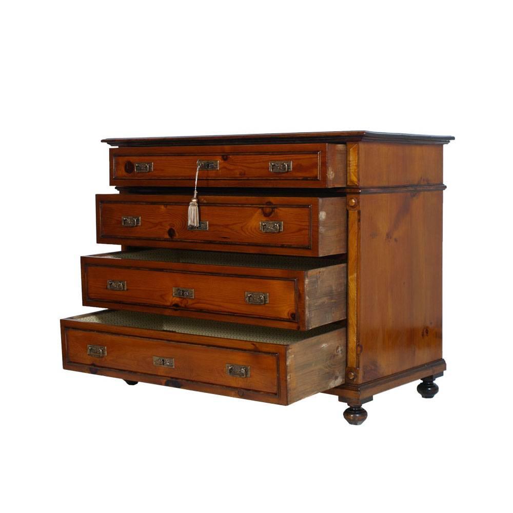 Mid 19th century neoclassic commode , chest of drawers , in solid larch wood, polished to wax .Embellishment of the front drawers with frame in walnut, so also the two side columns. Excellent aesthetic and patina result. All original bronze