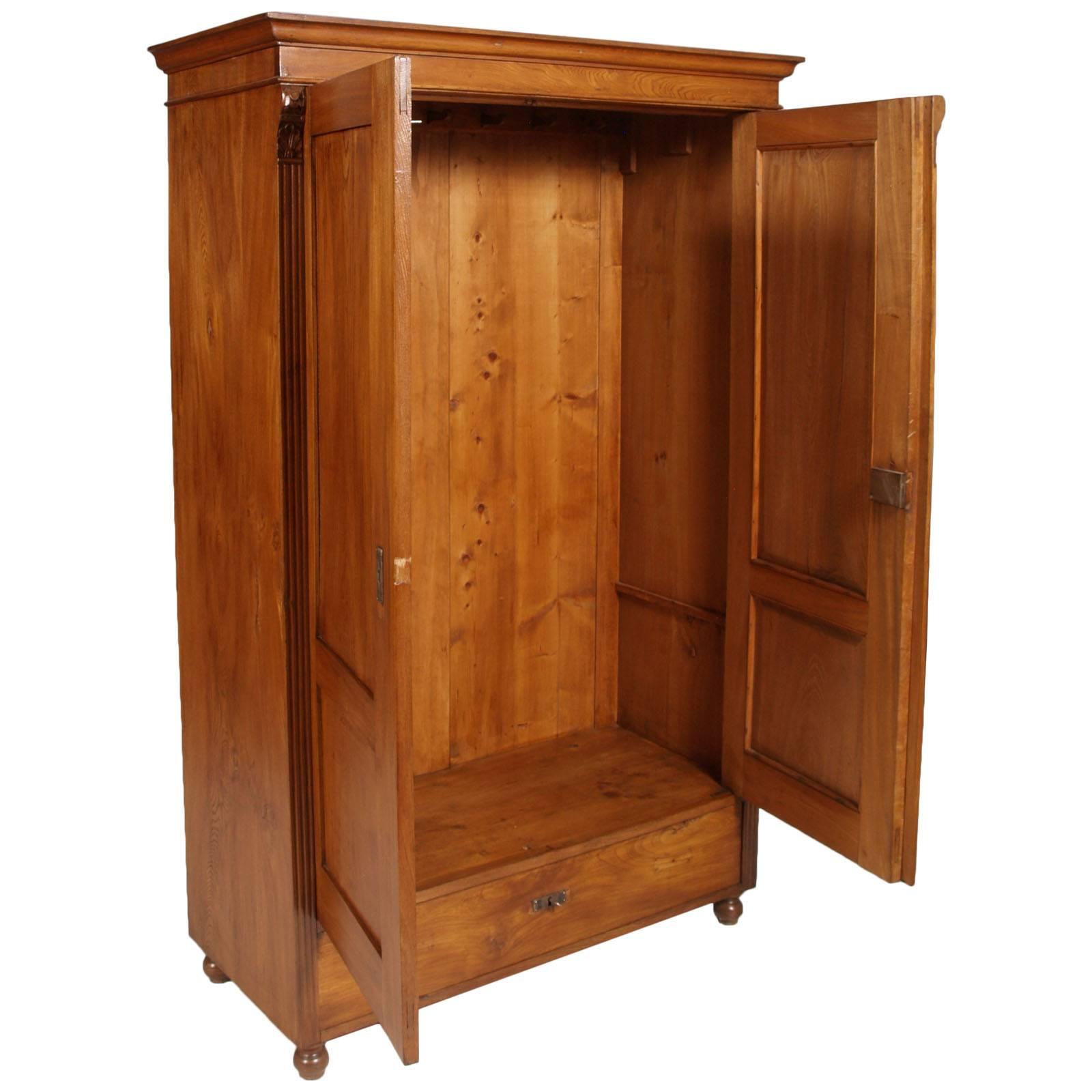 1850s antique neoclassic cabinet cupboard in solid elmwood restored and polished to wax

Measures cm: H 184, W 120, D 54.