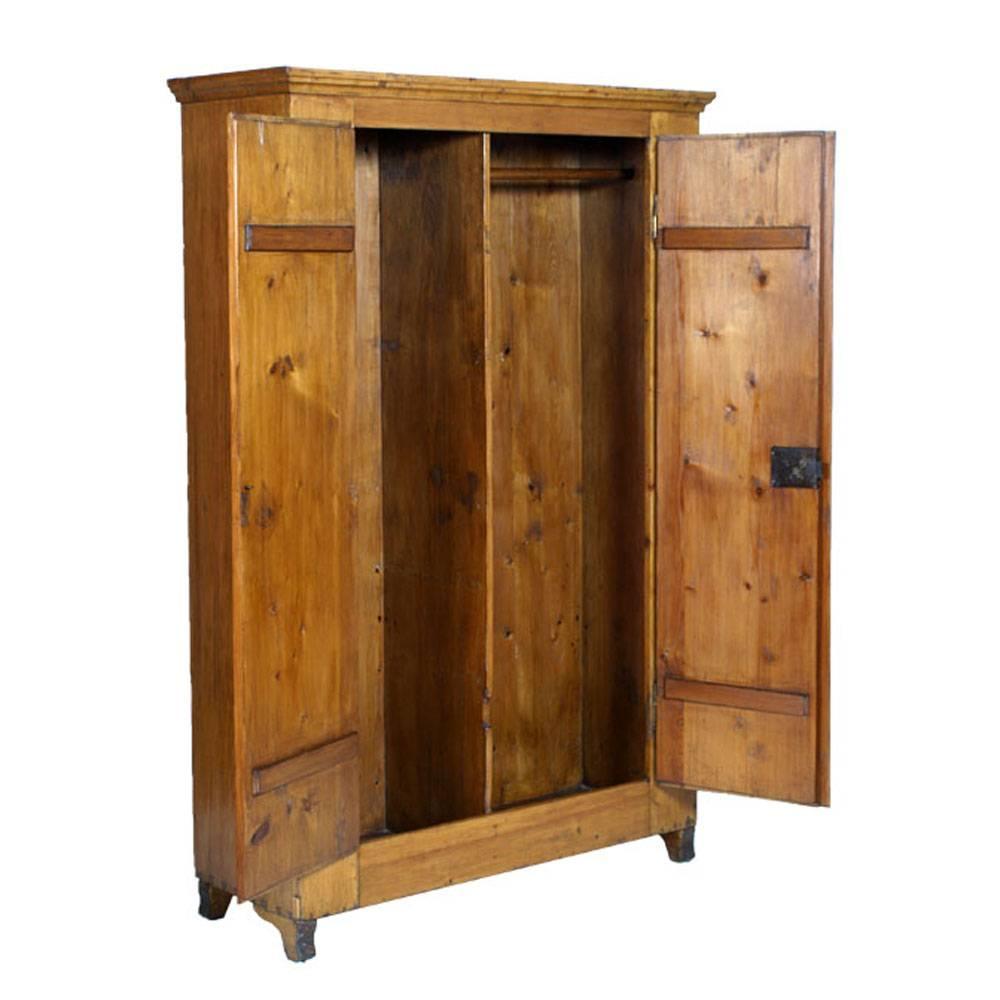 Late 19th century, Austrian neoclassical cupboard wardrobe in solid fir restored and wax polished
The left compartment can be divided by shelves with measurements on request

Measures cm: H 180, W 120, D 64.