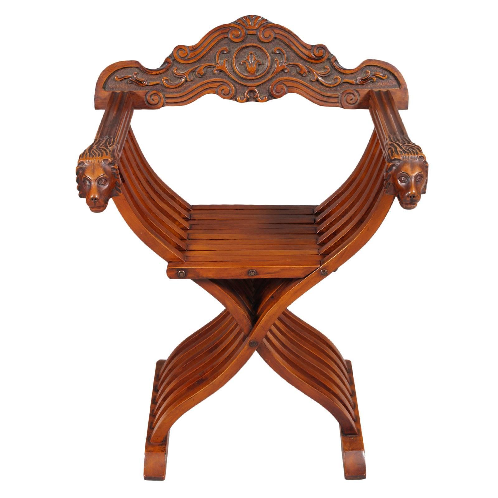 Important Original Florentine Renaissance Savonarola chair in carved walnut restored and polished to wax. Armrests ending with two finely hand-carved heads of lion: type of finish produced to indicate the power of the one who used it


About :