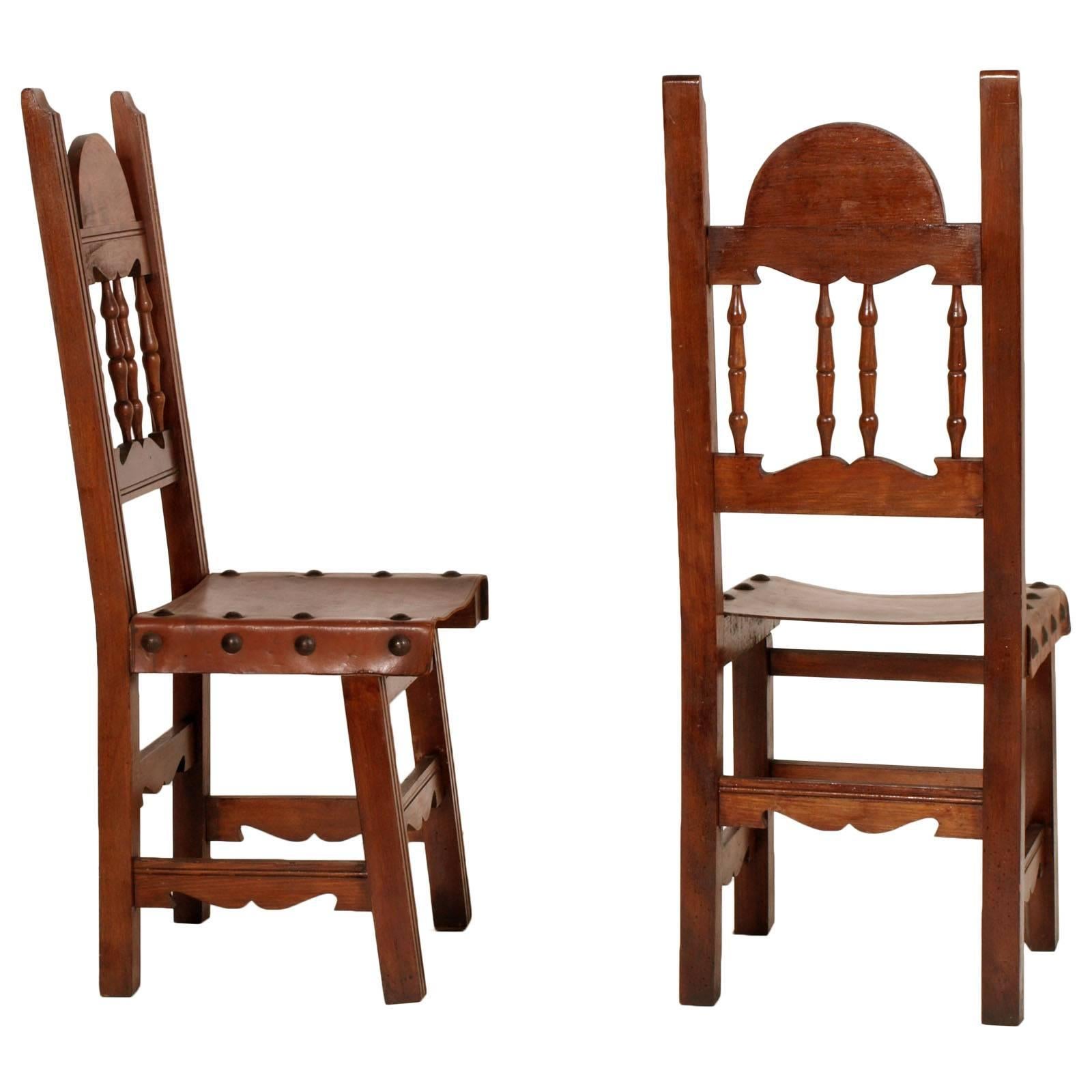 Renaissance Revival Early 20th C. Renaissance Couple Chairs in Solid Walnut and Leather , Restored